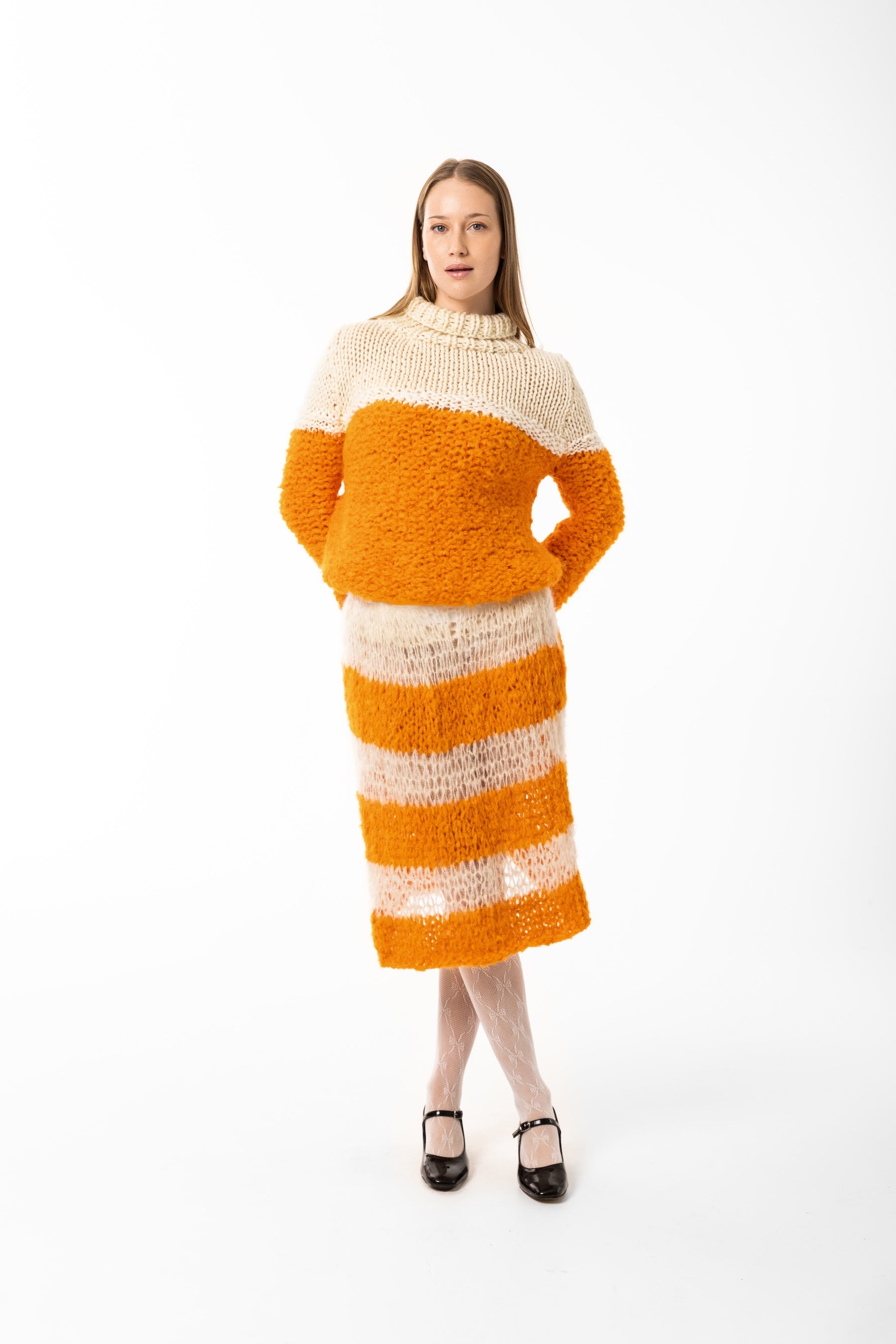 Íðunn off white and orange sweater